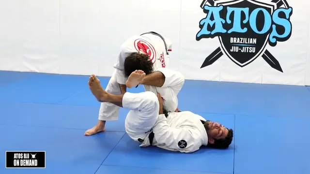 Collar Sleeve Omoplata Set up to Monoplata Submission - Andre Galvao