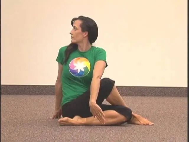 Simple Yoga Pose: Chakra 7, Asana 6 "Seated Spinal Twist" by Spiral Up Yoga