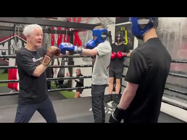 Offering some pointers to young boxers during a sparring session where learning is key.