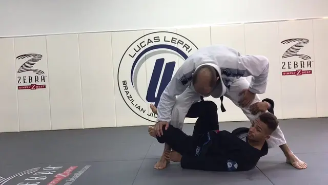 From De La Riva Guard To "Y" Guard Sweep by Jeffrey Cummings