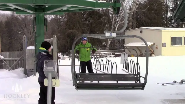 Ski Tip - How to carry your skis and get on the chairlift