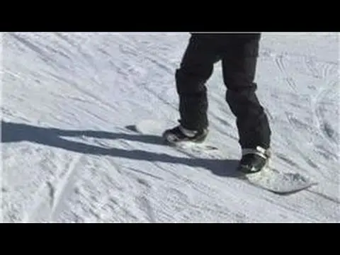 How to Snowboard : How to Grind on Snowboard Rails
