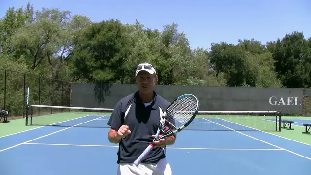 Tennis Serve - Top Spin - How To Relax Your Grip