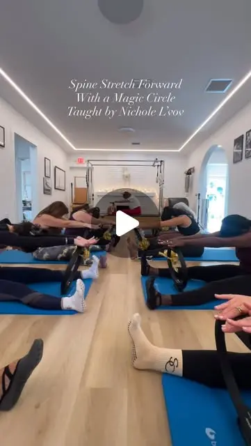 Spine Stretch Forward with the Magic Circle ...