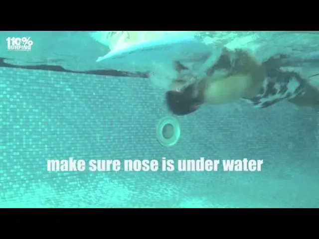 Eskimo Roll or Turtle Roll - Rolling Your Surfboard to Get Under Waves.